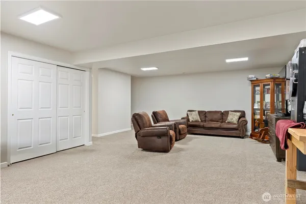 a living room with furniture and window