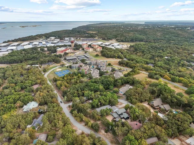 an aerial view of residential building with parking space