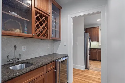a dining room with a large window and table
