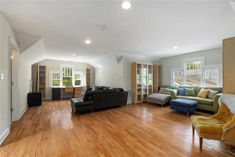 a bathroom with a sink toilet a shower curtain and a mirror