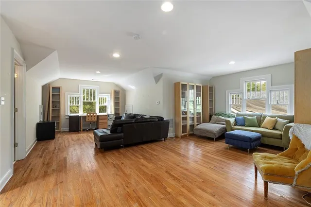 a bathroom with a sink toilet a shower curtain and a mirror