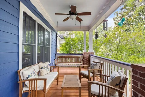 a view of balcony with furniture