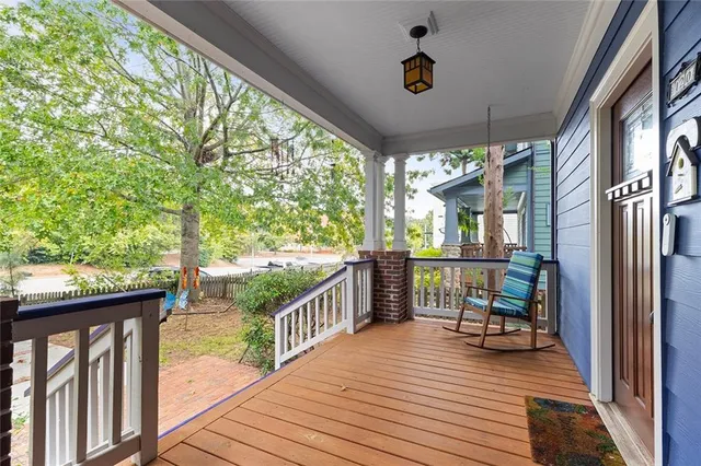 a view of a chairs and table in deck