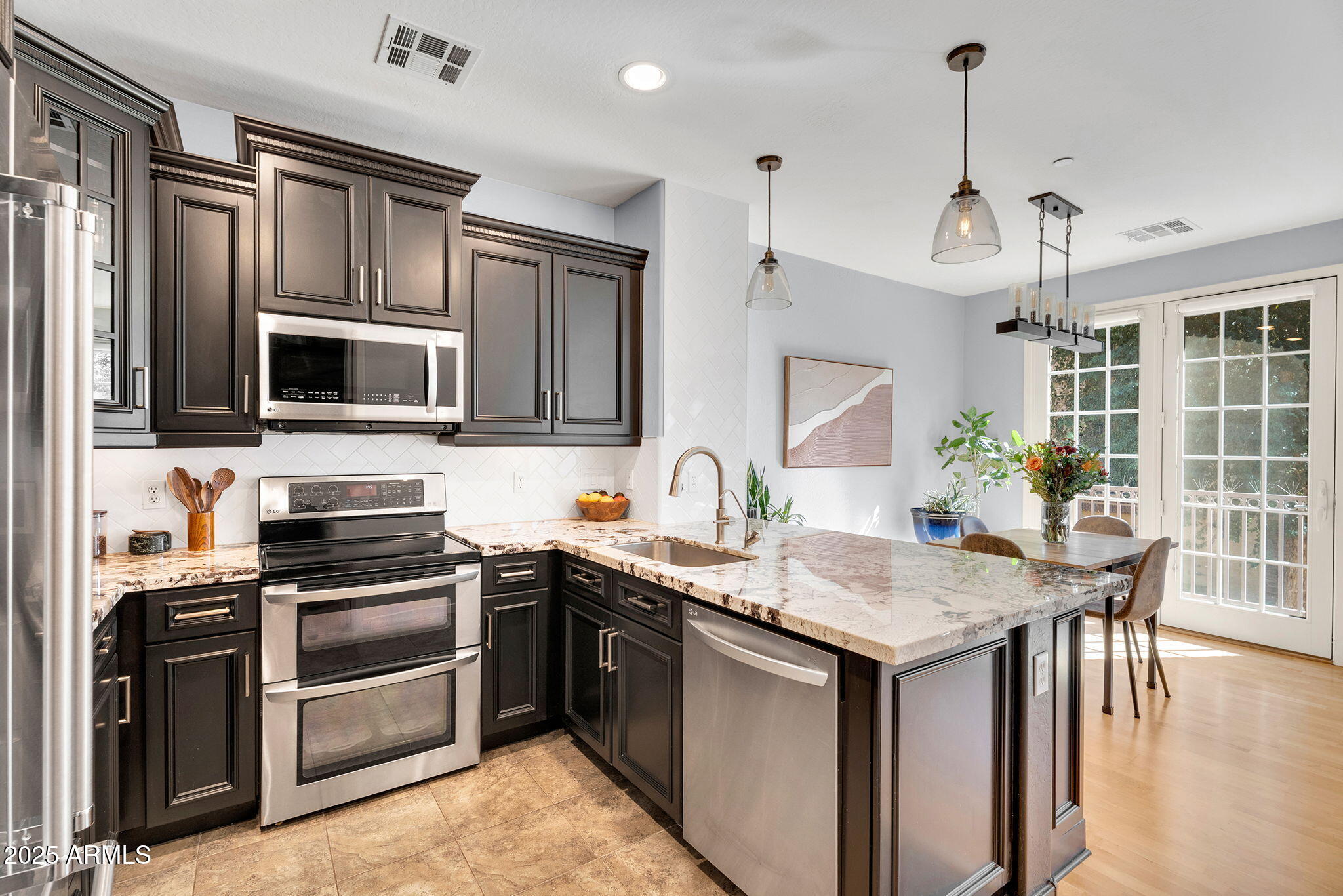 2446 East Roma Avenue Phoenix, AZ 85016 - Photo 11 of 37 Modern Kitchen & Dining Flow
