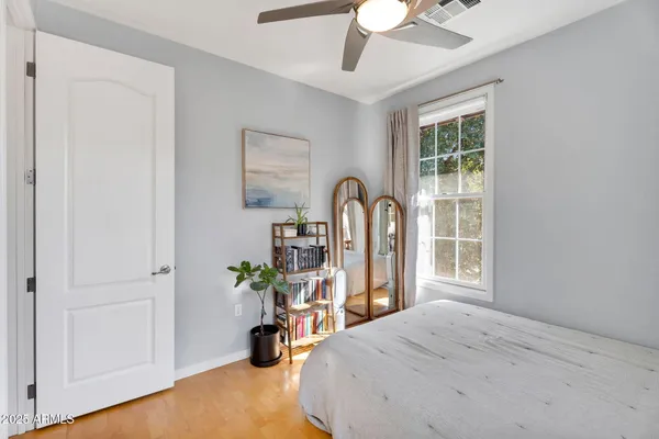 a view of a bedroom with gym equipment