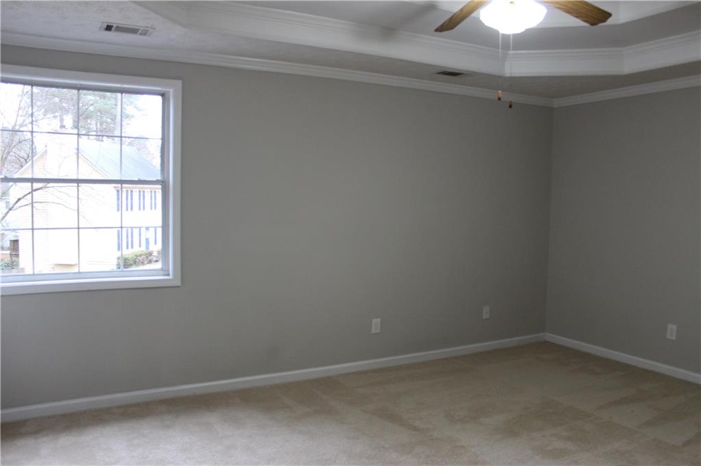 1250 Springmont Court Lawrenceville, GA 30043 - Photo 5 of 16 an empty room with a window