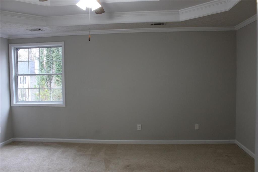 1250 Springmont Court Lawrenceville, GA 30043 - Photo 10 of 16 an empty room with a window