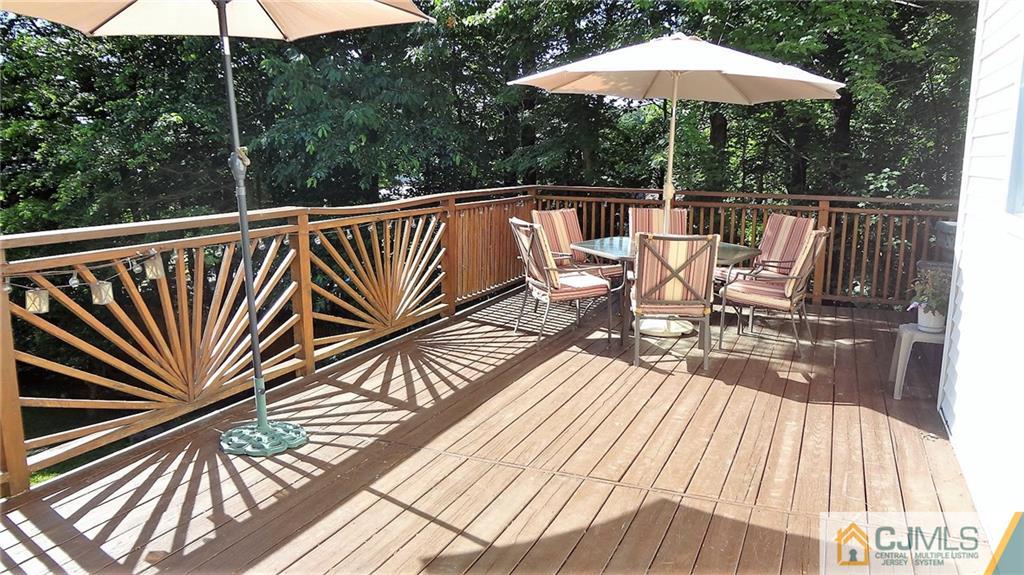 5 Verdi Road Monroe Township, NJ 08831 - Photo 11 of 25 a view of balcony with wooden floor and outdoor seating