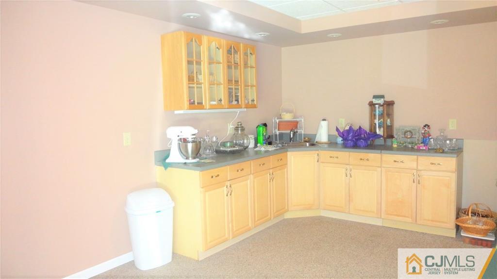 5 Verdi Road Monroe Township, NJ 08831 - Photo 19 of 25 a kitchen with sink and cabinets