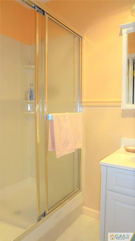 5 Verdi Road Monroe Township, NJ 08831 - Photo 20 of 25 a bathroom with a shower and a sink