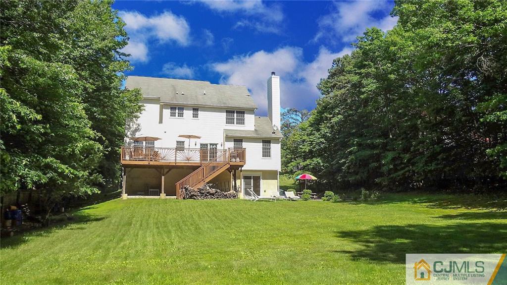 5 Verdi Road Monroe Township, NJ 08831 - Photo 25 of 25 a front view of a house with a yard and a tree