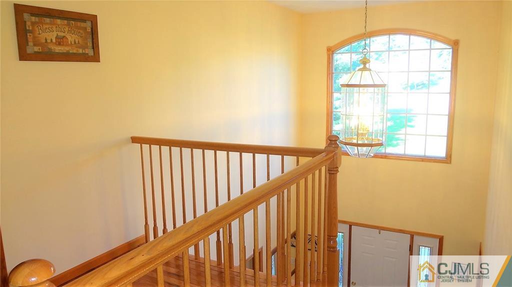 5 Verdi Road Monroe Township, NJ 08831 - Photo 4 of 25 a view of a hallway with a window