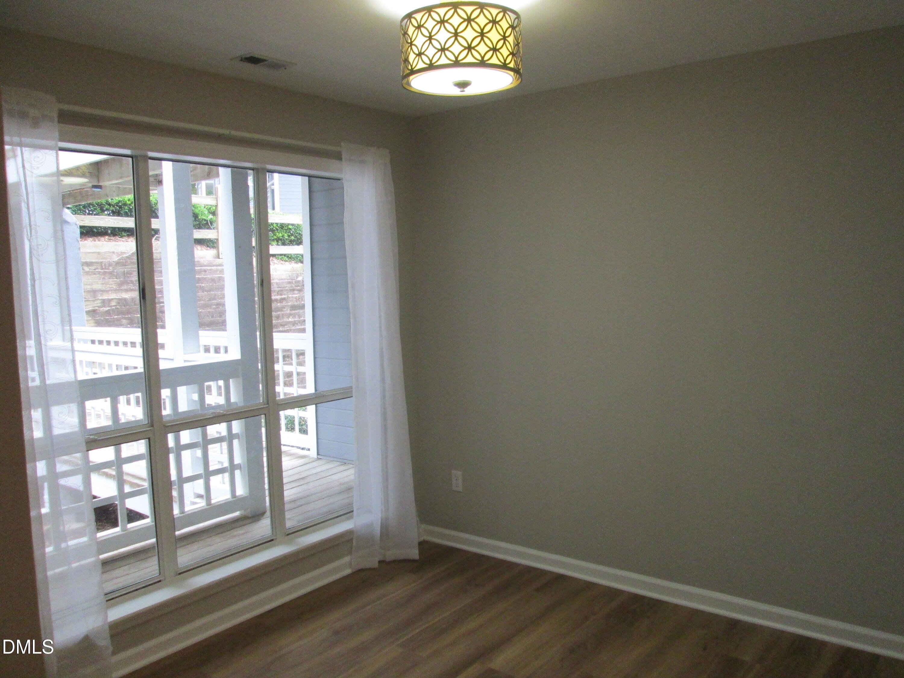 4651 Timbermill Court, Unit 103 Raleigh, NC 27612 - Photo 4 of 31 a view of entryway with window