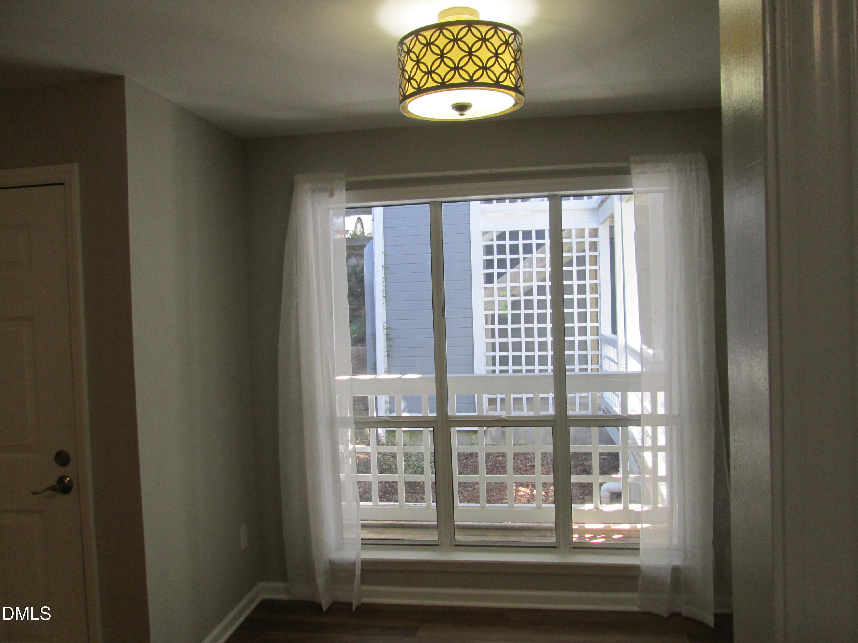 4651 Timbermill Court, Unit 103 Raleigh, NC 27612 - Photo 6 of 31 a view of room with a window