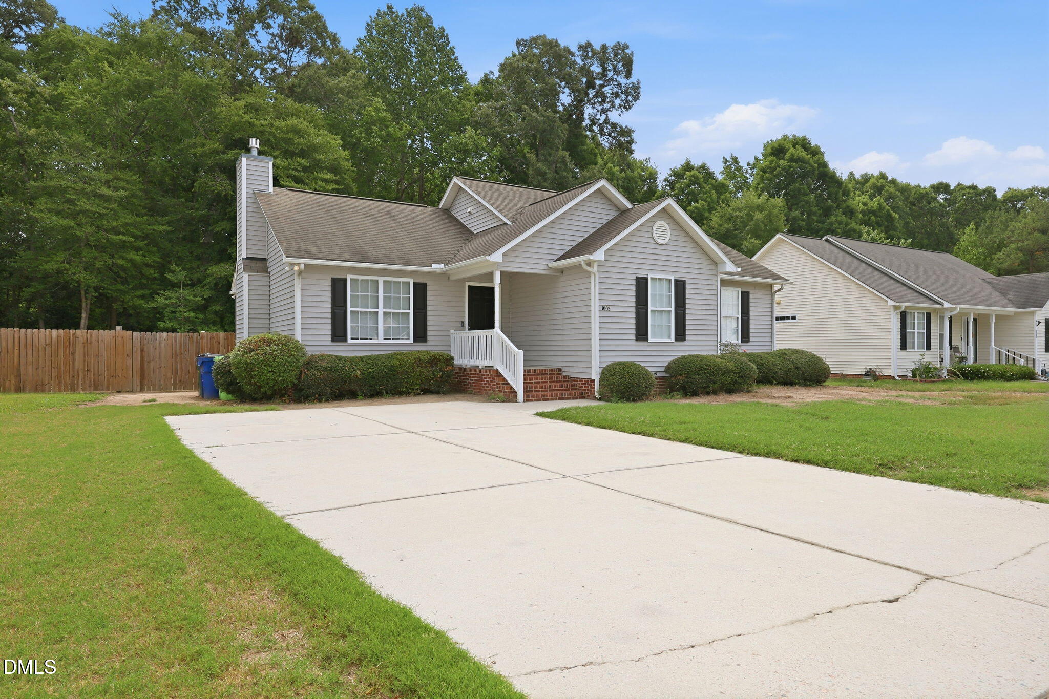 Spacious Driveway and Fenced Yard
