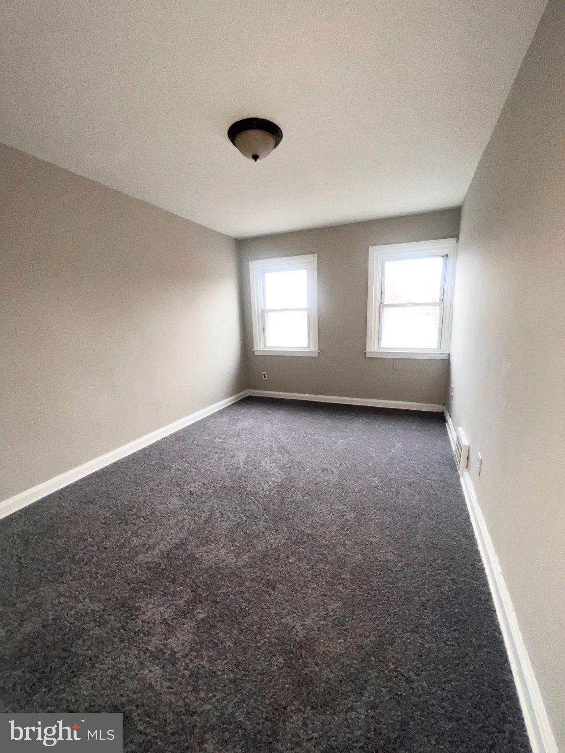 920 Butler Street Chester, PA 19013 - Photo 7 of 10 Bright and airy blank canvas room.