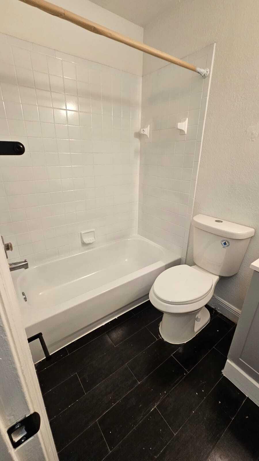 3391 Avenue South Riviera Beach, FL 33404 - Photo 13 of 16 a bathroom with a toilet and a shower