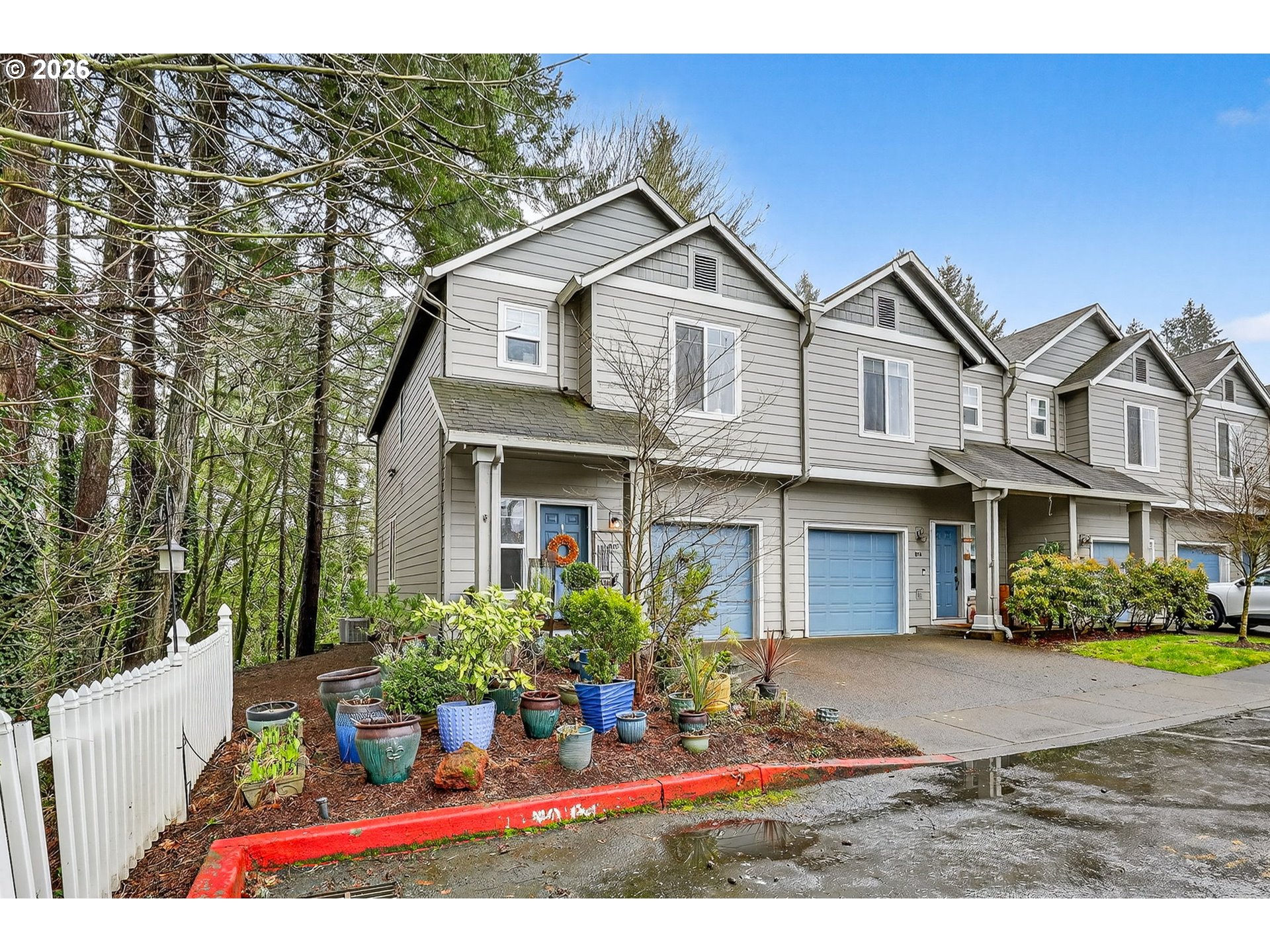 810 East 9th Street, Unit D13 Newberg, OR 97132 - Photo 2 of 42 a front view of a house with a yard