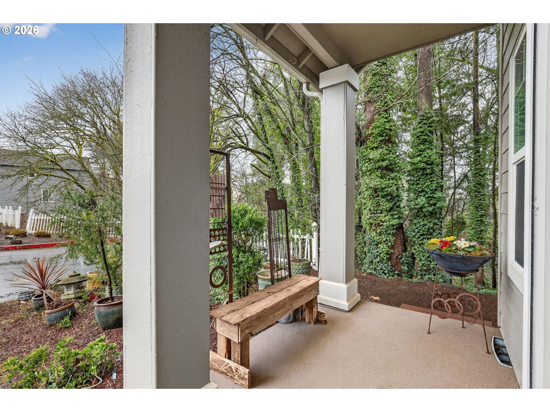 810 East 9th Street, Unit D13 Newberg, OR 97132 - Photo 5 of 42 a view of a patio with table and chairs and potted plants