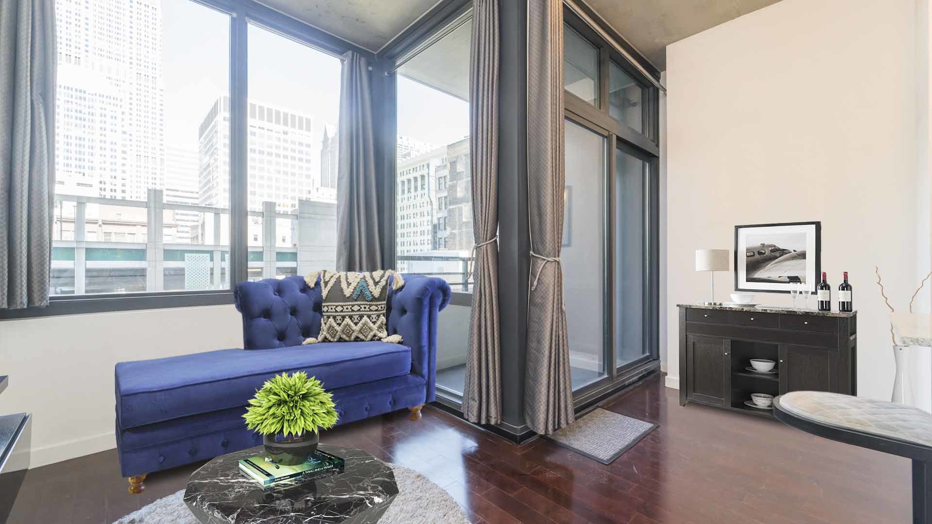 235 West Van Buren Street, Unit 1519 Chicago, IL 60607 - Photo 2 of 10 a living room with furniture and wooden floor