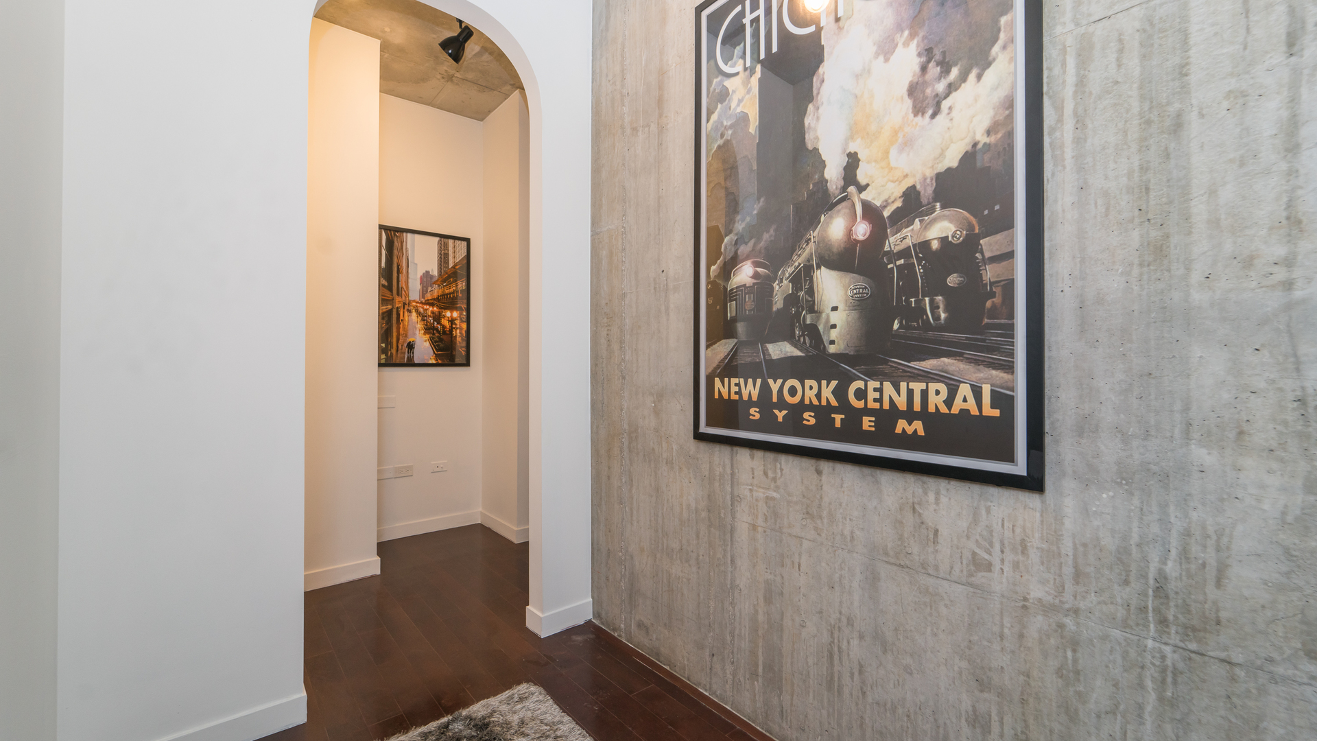 235 West Van Buren Street, Unit 1519 Chicago, IL 60607 - Photo 9 of 10 a sign that is on a brick wall