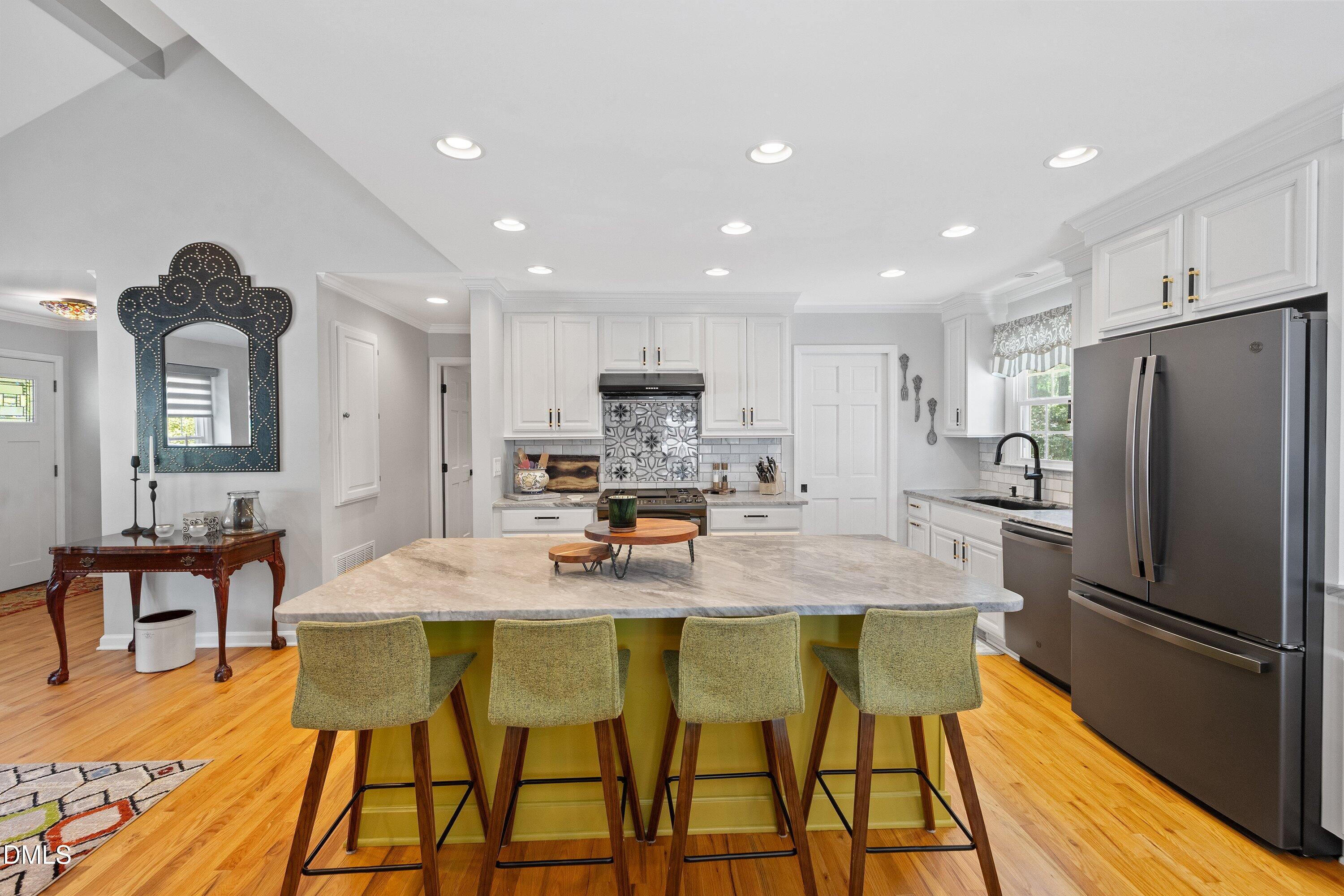 6540 Wynbrook Way Raleigh, NC 27612 - Photo 11 of 47 Kitchen with island.
