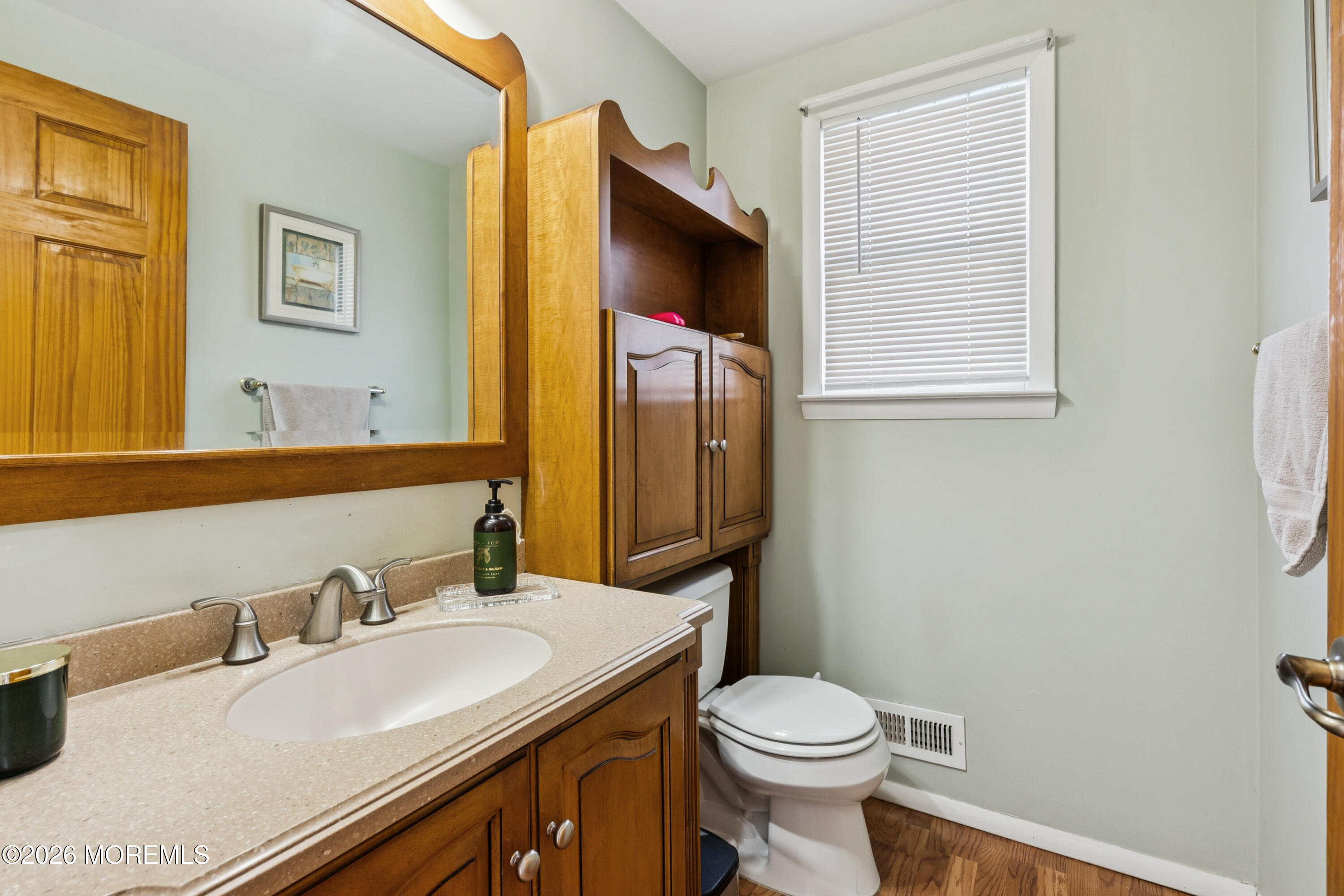 5 Liberty Court Howell, NJ 07731 - Photo 14 of 30 a bathroom with a granite countertop sink toilet and mirror