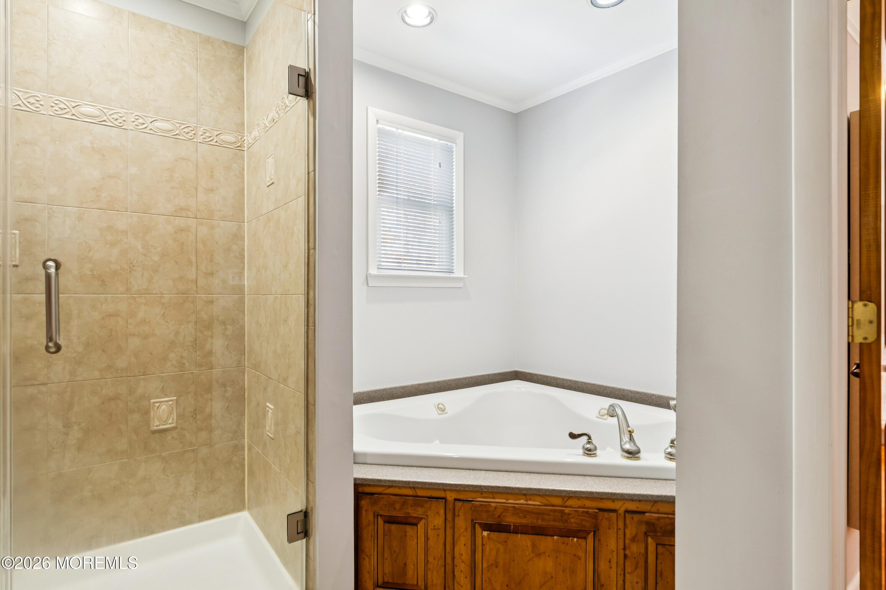 5 Liberty Court Howell, NJ 07731 - Photo 17 of 30 a bathroom with a granite countertop sink a mirror and shower