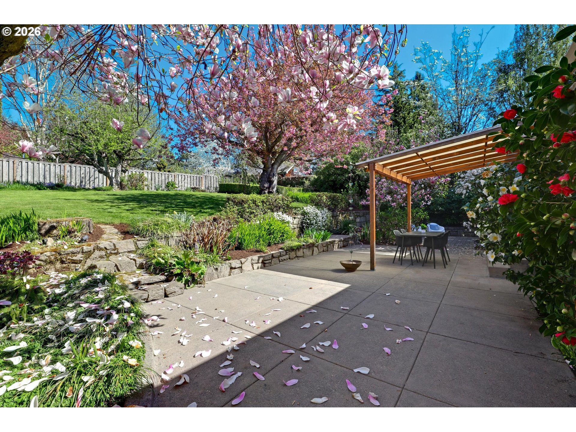 7021 Southwest Canyon Lane Portland, OR 97225 - Photo 21 of 25 a view of a patio with a table and chairs