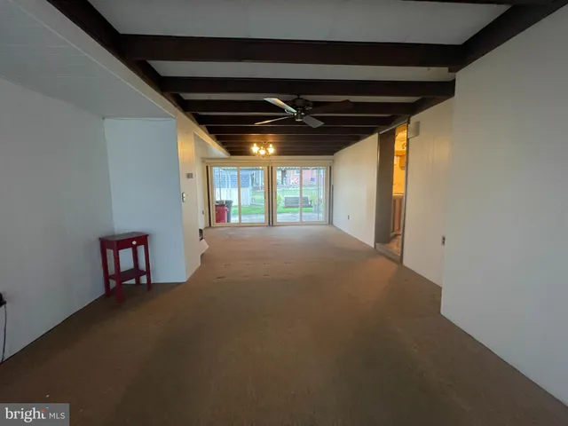 a view of a room with windows