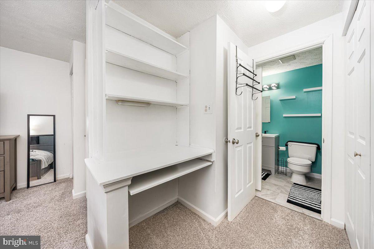10109 Shelldrake Circle Damascus, MD 20872 - Photo 26 of 47 a bathroom with a sink and a mirror
