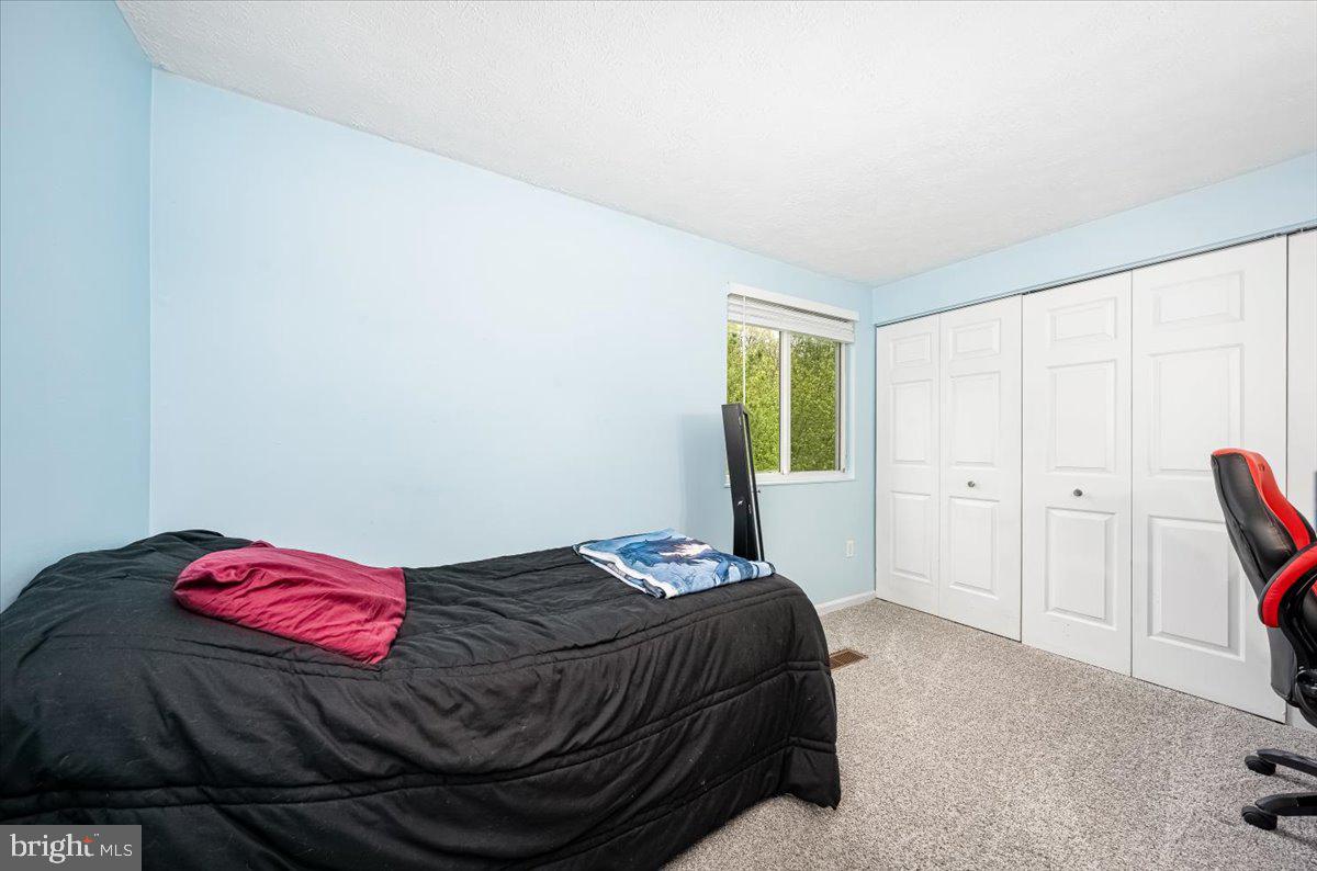 10109 Shelldrake Circle Damascus, MD 20872 - Photo 29 of 47 a bedroom with a bed and a window