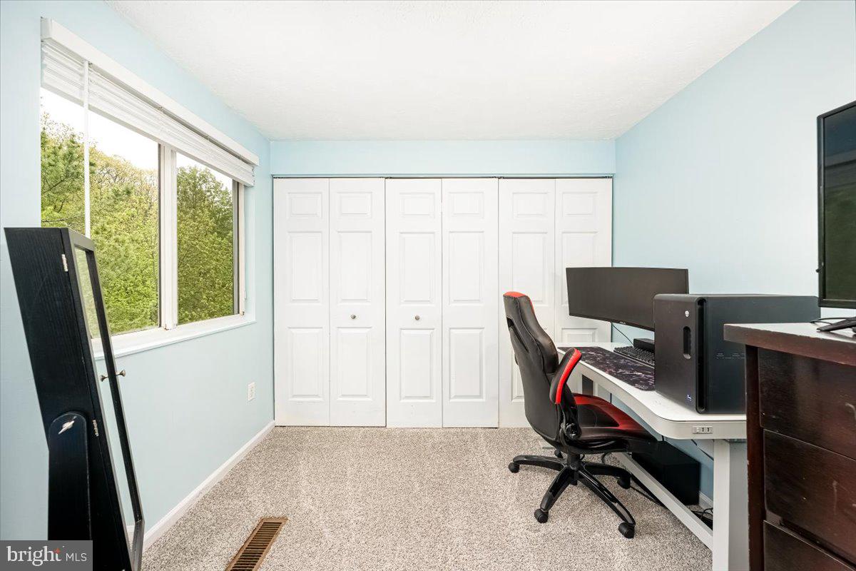 10109 Shelldrake Circle Damascus, MD 20872 - Photo 30 of 47 a view of a workspace with furniture and a window
