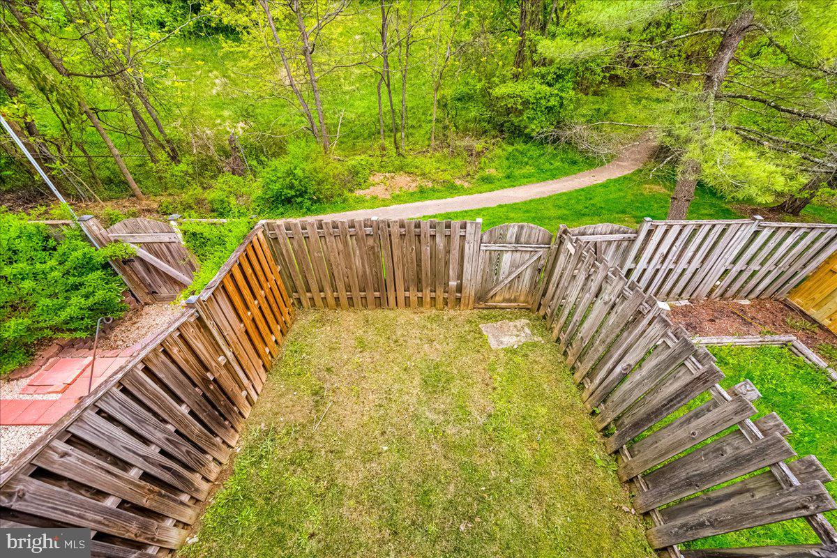 10109 Shelldrake Circle Damascus, MD 20872 - Photo 41 of 47 a balcony with trees in front of it