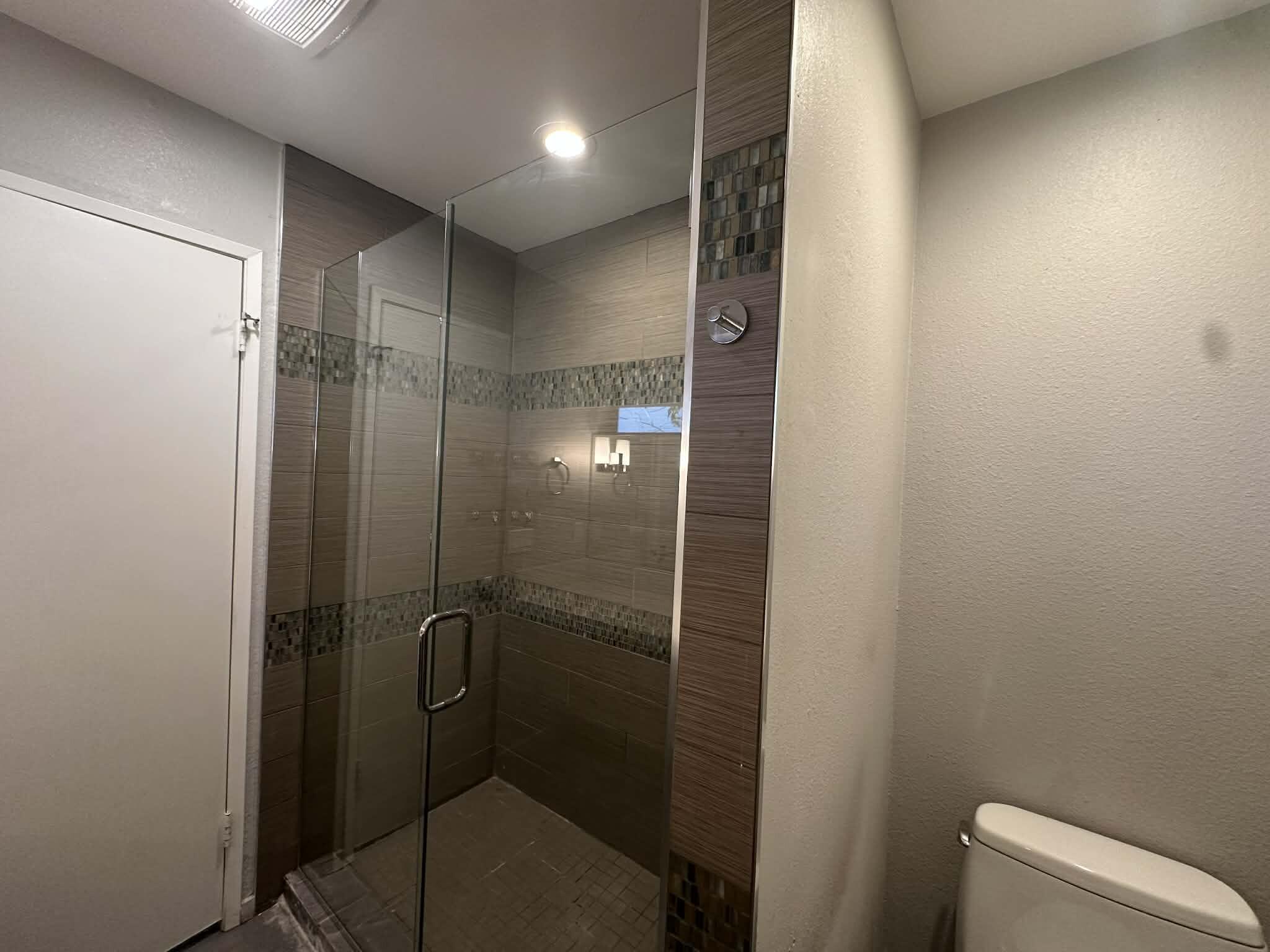 4 Saturn Circle Rancho Mirage, CA 92270 - Photo 15 of 32 a bathroom with a shower and toilet
