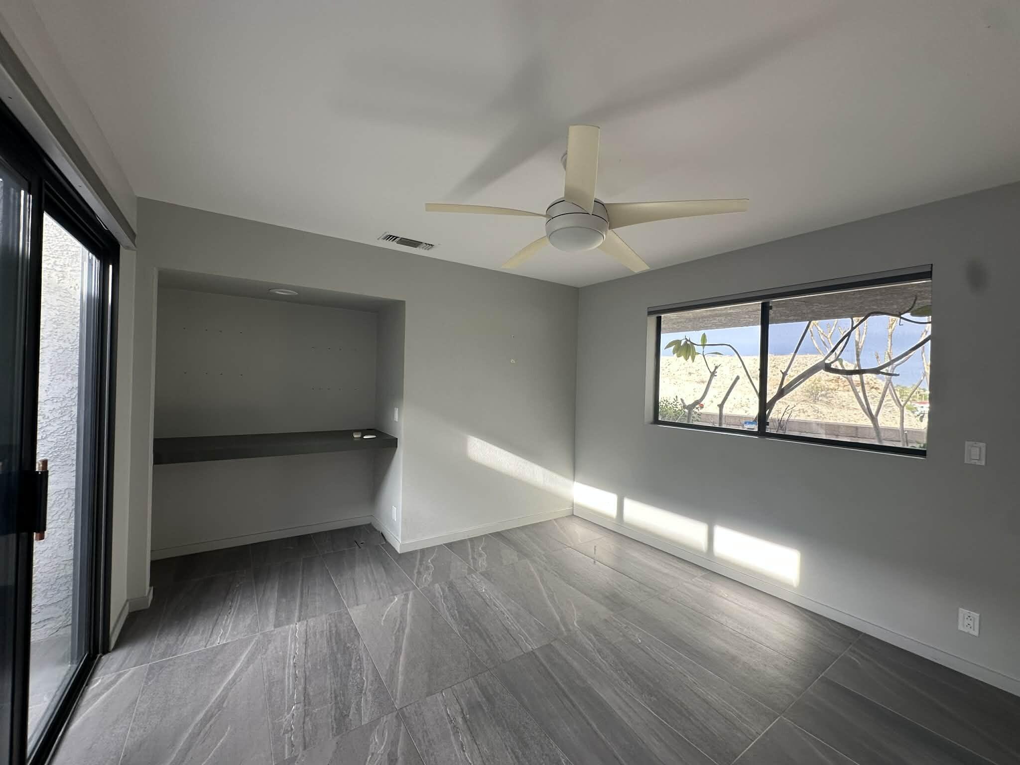 4 Saturn Circle Rancho Mirage, CA 92270 - Photo 16 of 32 wooden floor in an empty room with a window