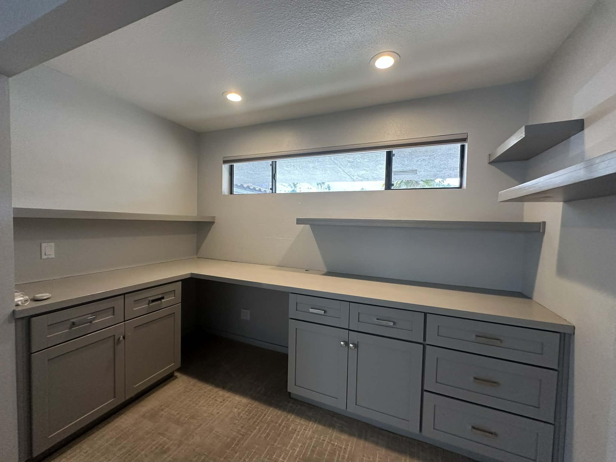4 Saturn Circle Rancho Mirage, CA 92270 - Photo 20 of 32 a kitchen with a sink and cabinets