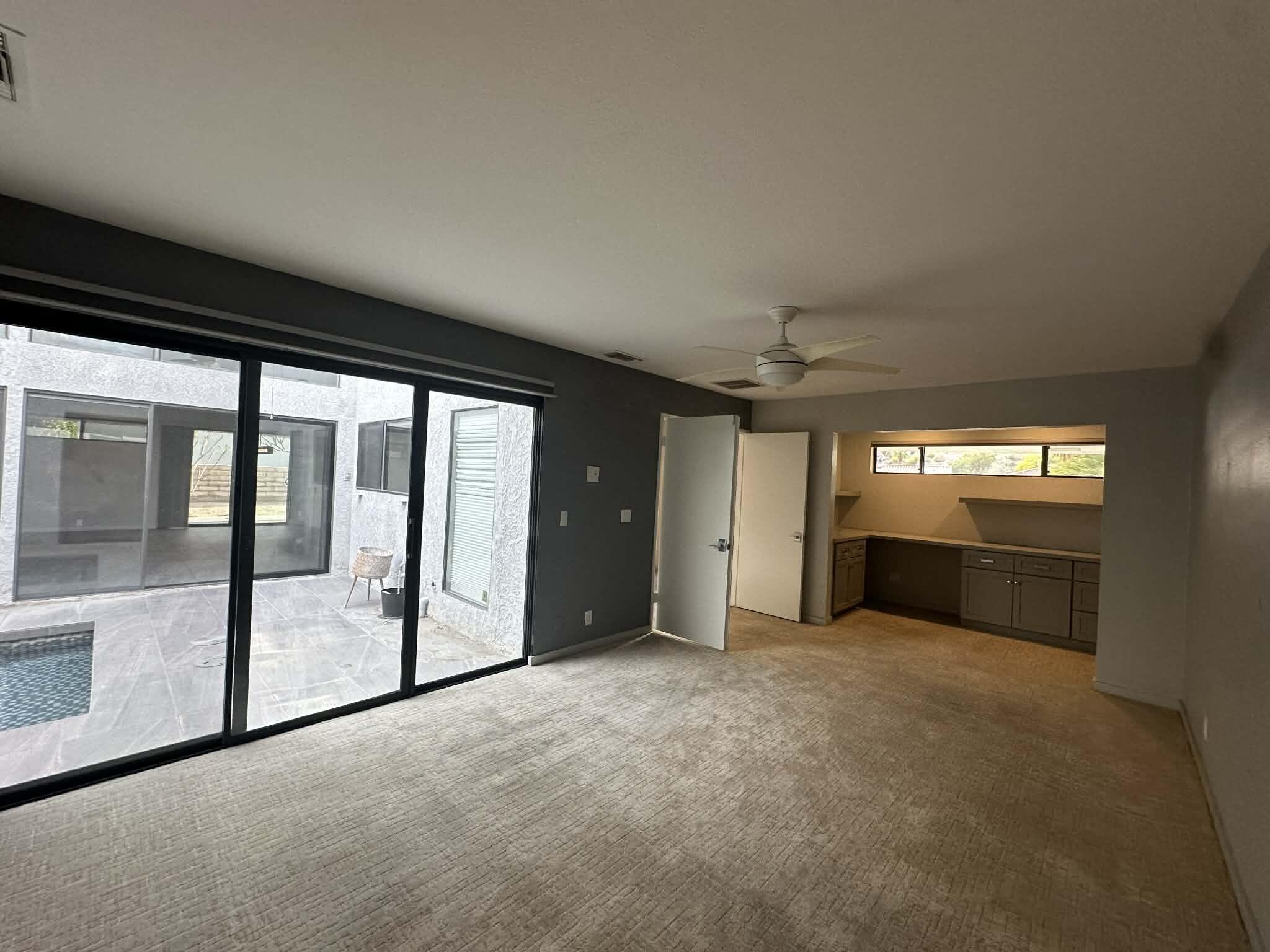 4 Saturn Circle Rancho Mirage, CA 92270 - Photo 23 of 32 a view of an empty room with a fireplace