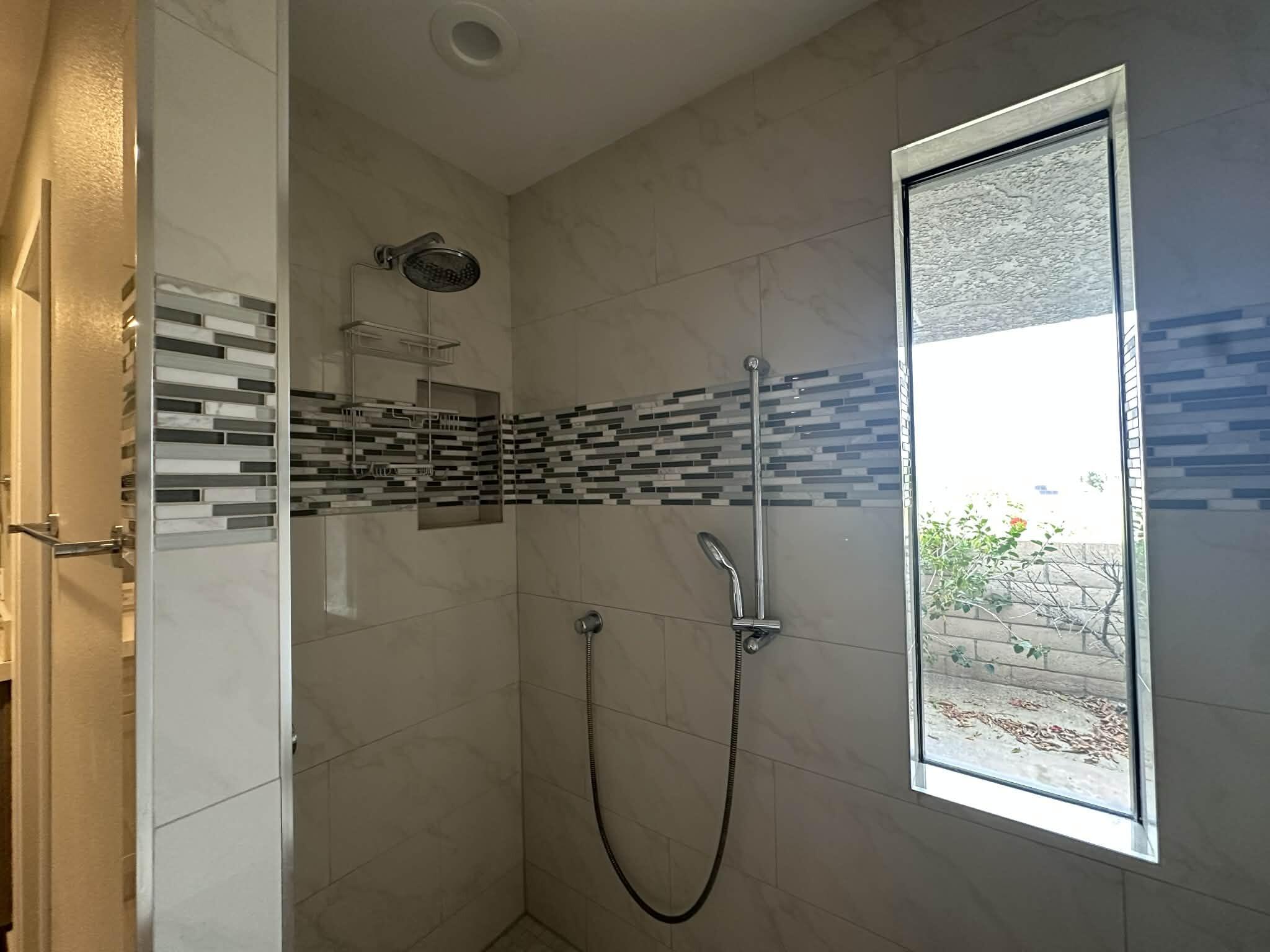 4 Saturn Circle Rancho Mirage, CA 92270 - Photo 28 of 32 a bathroom with a shower