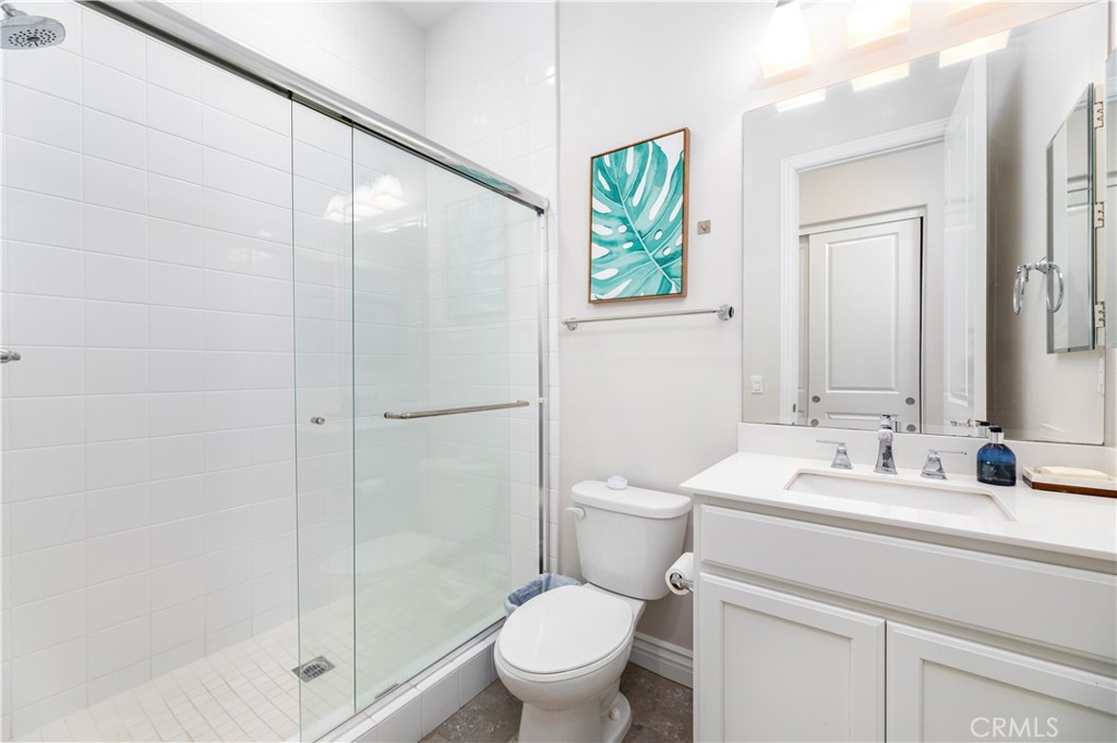 60 Gainsboro Irvine, CA 92620 - Photo 15 of 34 a bathroom with a sink toilet and shower