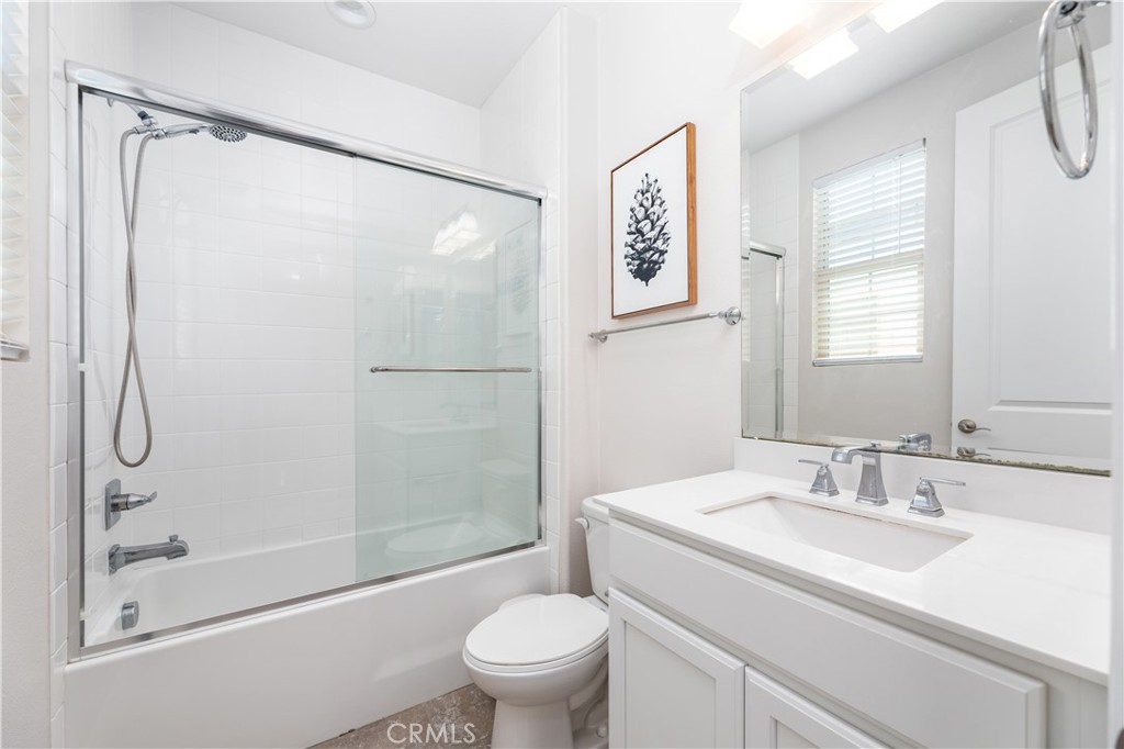 60 Gainsboro Irvine, CA 92620 - Photo 16 of 34 a bathroom with a granite countertop sink toilet and shower