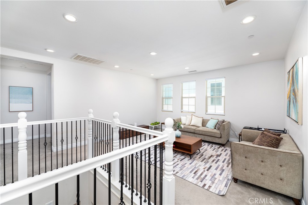 60 Gainsboro Irvine, CA 92620 - Photo 19 of 34 a view of a livingroom with furniture and windows
