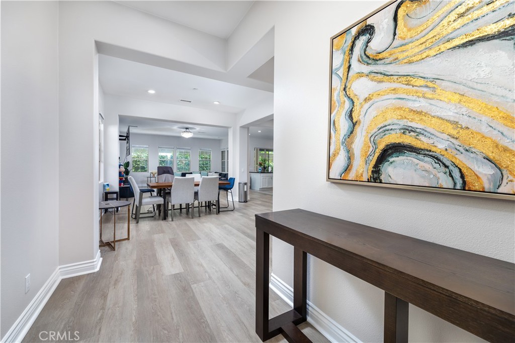 60 Gainsboro Irvine, CA 92620 - Photo 2 of 34 a living room with furniture and a wooden floor