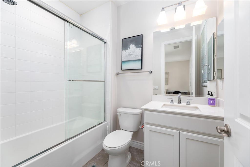 60 Gainsboro Irvine, CA 92620 - Photo 27 of 34 a bathroom with a sink toilet and shower
