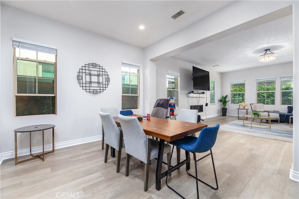 60 Gainsboro Irvine, CA 92620 - Photo 3 of 34 a view of a dining room with furniture window and outside view