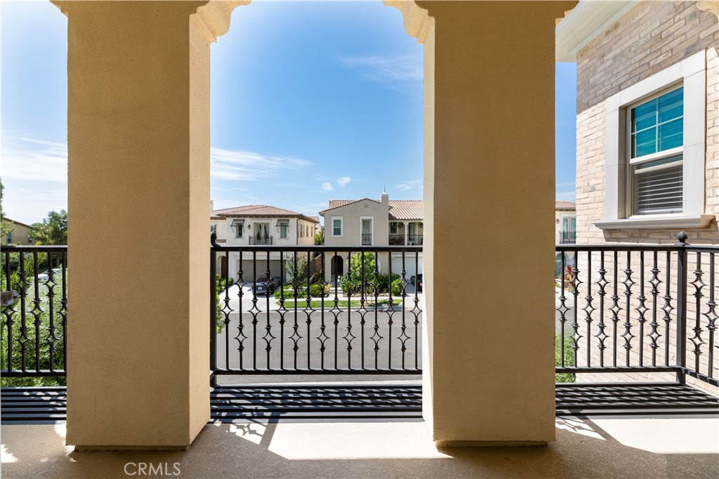 60 Gainsboro Irvine, CA 92620 - Photo 32 of 34 a view of a balcony with a floor to ceiling window