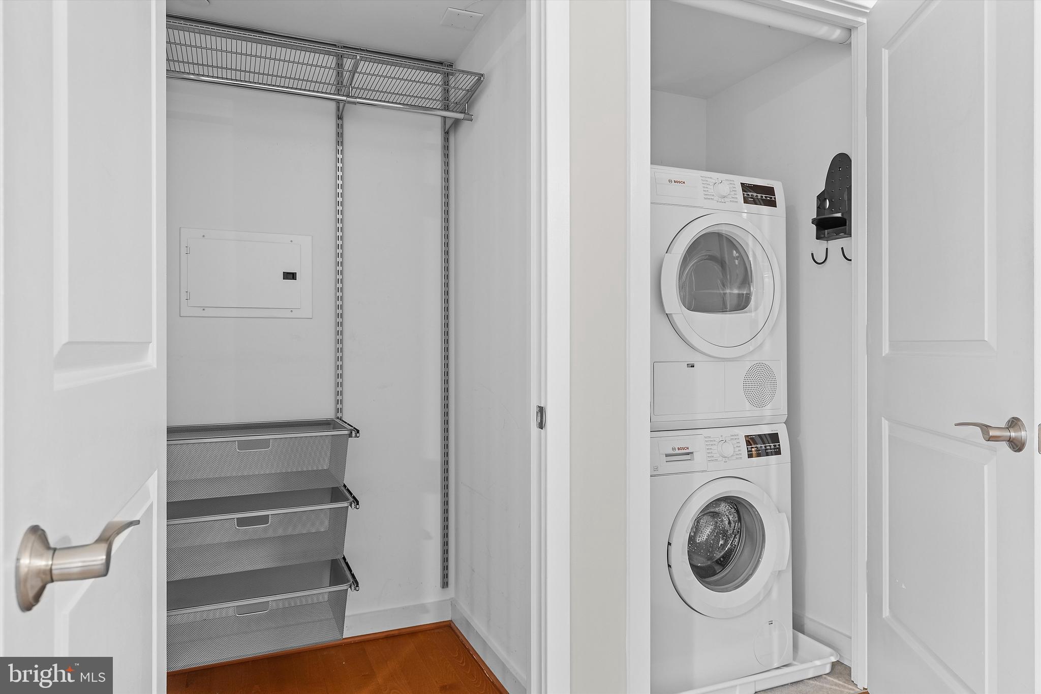 1025 First Street Southeast, Unit 1114 Washington, DC 20003 - Photo 17 of 23 a view of a storage & utility room with washer and dryer