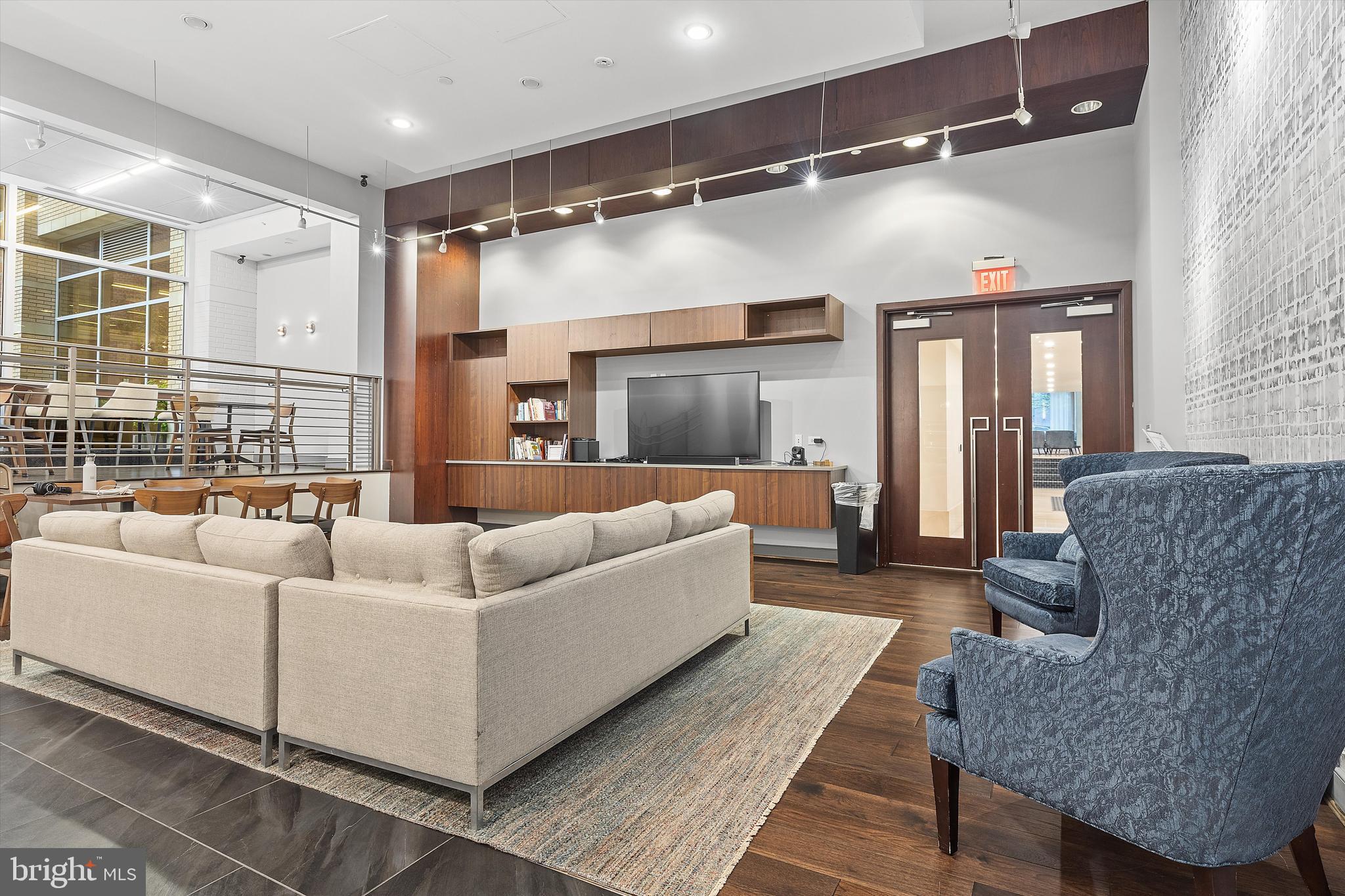 1025 First Street Southeast, Unit 1114 Washington, DC 20003 - Photo 18 of 23 a living room with furniture and a large window