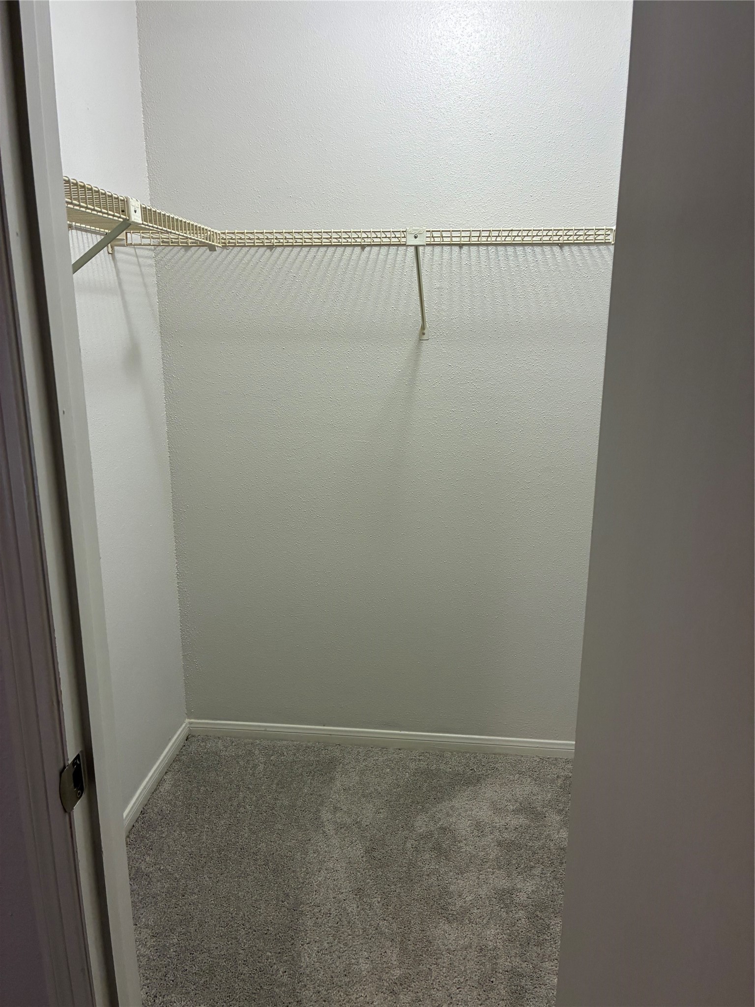 2121 Hepburn Street, Unit 404 Houston, TX 77054 - Photo 16 of 30 a view of small space with racks on the wall