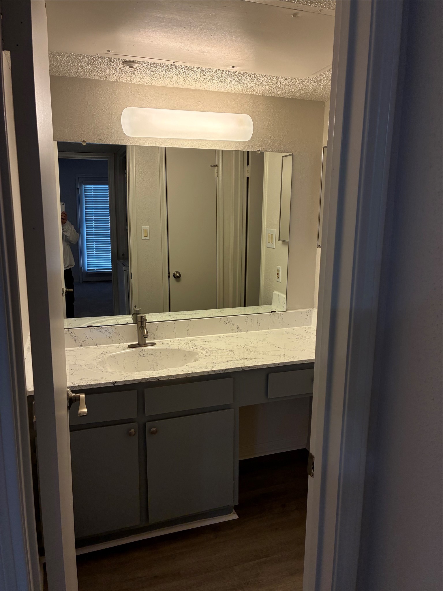 2121 Hepburn Street, Unit 404 Houston, TX 77054 - Photo 26 of 30 a bathroom with a double vanity sink and a mirror